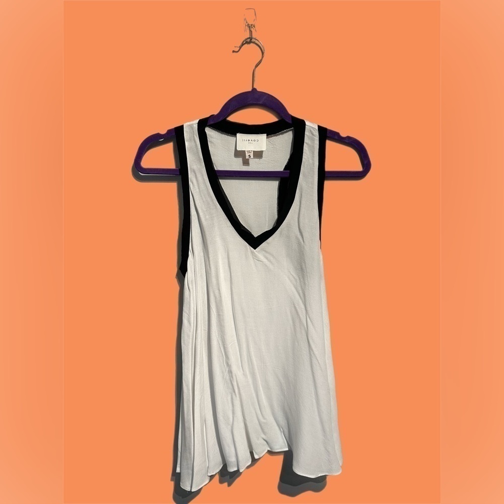 🌸The Coverii, sleeveless shirt. White with black hem. Size small.